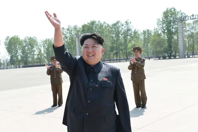 North Korean leader Kim Jong Un waves during a photo session with the participants of the Fifth Conference of the Training Officers of the KPA, in this undated photo released by North Korea's Korean Central News Agency (KCNA) May 1, 2015. (Photo by Reuters/KCNA)