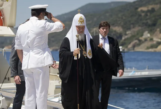 Patriarch Kirill of Moscow, center, arrives to the port of Dafni, at Mount Athos, Greece, Friday, May 27, 2016, a day ahead of Russia's President Putin's visit. (Photo by Darko Bandic/AP Photo)