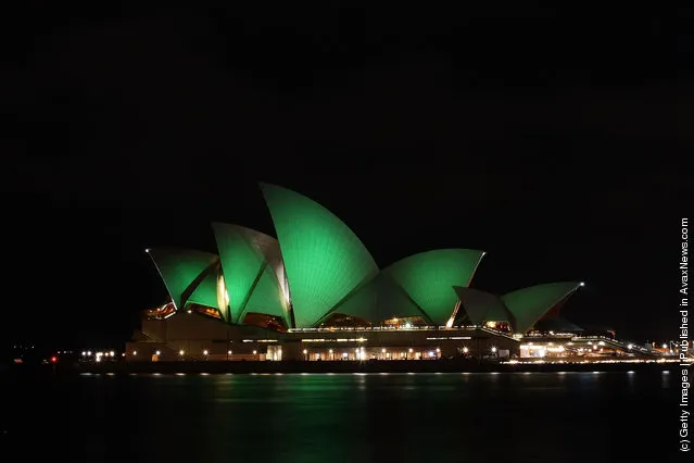 The Sydney Opera House is illuminated green on March 17, 2012 in Sydney, Australia