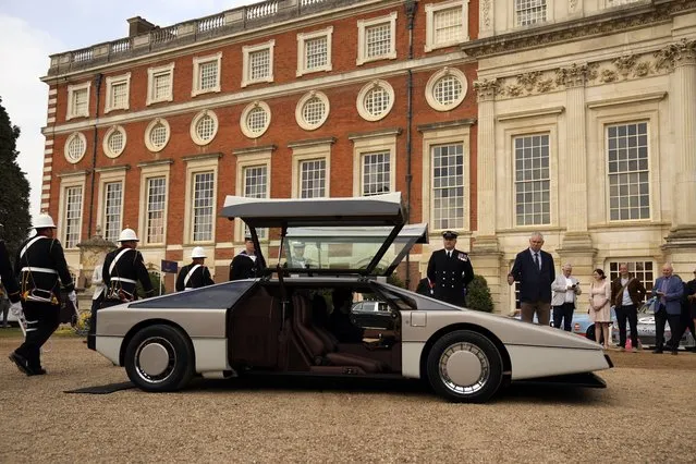 The Aston Martin Bulldog, which is a 1979 one-off concept vehicle and the only one of its kind ever made, stands unveiled after being restored after laying dormant for 35 years, at Hampton Court Palace, in south west London, Friday, September 3, 2021. It was originally designed with the aim of being the fastest on the road production car in the world, clocking up a speed of 192 miles an hour at a test track, with the aim now being to get the car to reach 200 miles an hour after its recent restoration. (Photo by Matt Dunham/AP Photo)