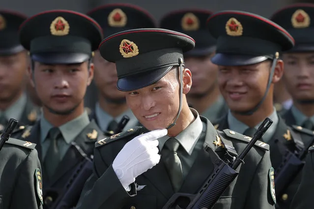 Soldiers rehearse before being inspected by Chinese President Xi Jinping at the Shek Kong Barracks in Hong Kong, Friday, June 30, 2017. (Photo by Kin Cheung/AP Photo)