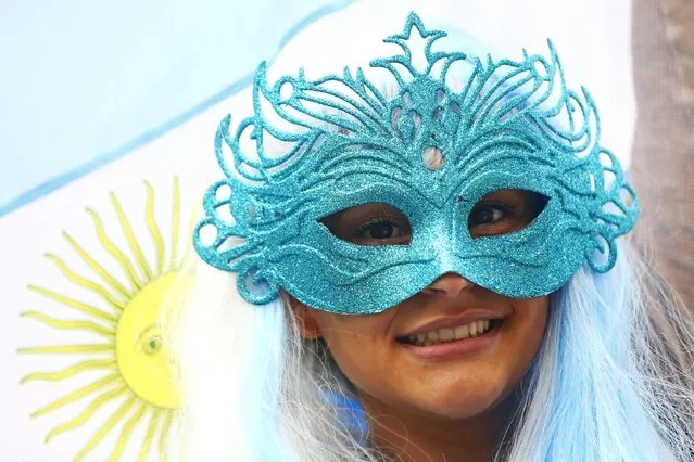 An Argentina fan enjoys the atmosphere prior to the 2014 FIFA World Cup Brazil Semi Final match between the Netherlands and Argentina at Arena de Sao Paulo on July 9, 2014 in Sao Paulo, Brazil. (Photo by Jamie Squire/Getty Images)