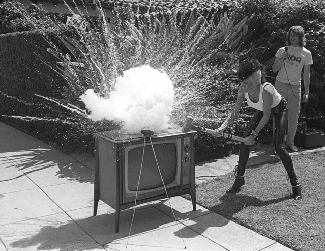 Punk Rock Star Wendy O. Williams smashes a television set for a radio station contest in Pasadena, Calif., in this June 16, 1981 photo. Williams, whose stage theatrics as lead singer of the punk band The Plasmatics included blowing up equipment and chain-sawing guitars, died of a self-inflicted gunshot wound. She was 48.  Williams' former manager and longtime companion Rod Swenson said he discovered her body Monday, April 6, 1998, in a wooded area near their home. (Photo by AP Photo)