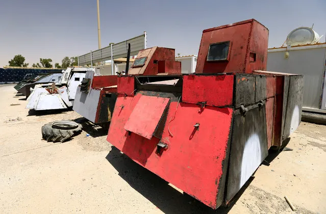 Vehicles used for suicide car bombings, made by Islamic State militants, are seen at Federal Police Headquarters after being confiscated in Mosul, Iraq on  July 13, 2017. (Photo by Thaier Al-Sudani/Reuters)