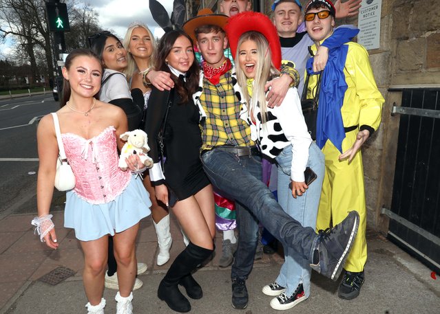 Boozed-out revellers donned fancy dress as they welcomed in the Bank Holiday at the Otley Run. Hundreds swarmed Leeds, UK on Saturday, March 30, 2024, as the infamous tipple mission got underway beneath blue skies and sunshine. (Photo by NB Press LTD)