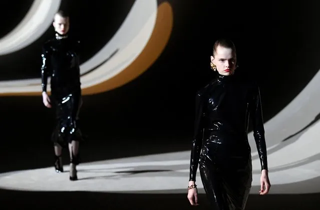 Models present creations by designer Anthony Vaccarello as part of his Fall/Winter 2020/21 women's ready-to-wear collection show for fashion house Saint Laurent during Paris Fashion Week in Paris, France, February 25, 2020. (Photo by Piroschka van de Wouw/Reuters)