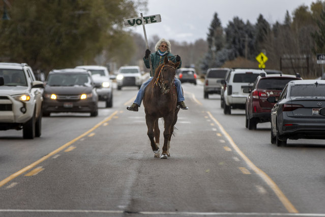 Vancie Tuner and her horse Clementine, beloved residents of Teton County, rally people on Main St. to vote on November 5, 2024 in Driggs, Idaho. Americans cast their ballots today in the presidential race between Republican nominee former President Donald Trump and Democratic nominee Vice President Kamala Harris, as well as multiple state elections that will determine the balance of power in Congress. (Photo by Natalie Behring/Getty Images)