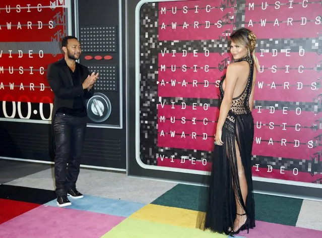 Musician John Legend and model Chrissy Teigen arrive at the 2015 MTV Video Music Awards in Los Angeles, California, August 30, 2015. (Photo by Danny Moloshok/Reuters)