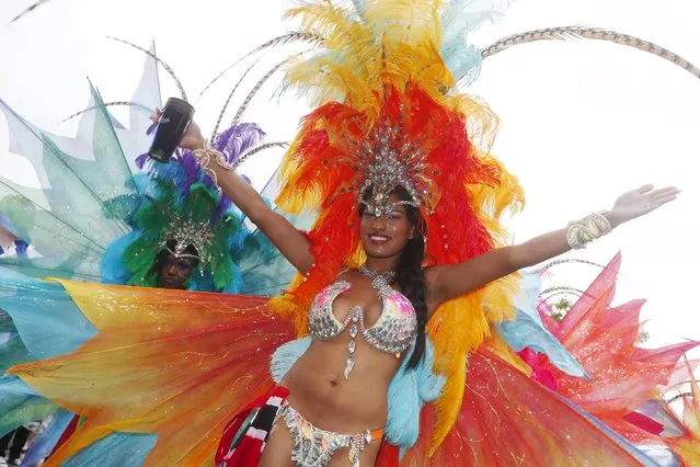 A performer poses for a photograph at the Notting Hill Carnival in west London, August 31, 2015. (Photo by Eddie Keogh/Reuters)