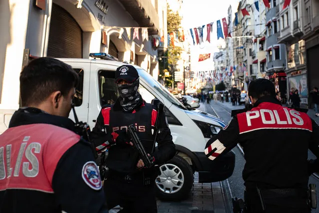 Emergency personnel investigate the scene after an explosion occurred on Istiklal street, a busy pedestrian thoroughfare on November 13, 2022 in Istanbul, Turkey. (Photo by Burak Kara/Getty Images)