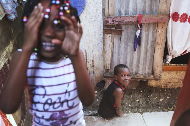 Children play at a shelter for families displaced by gang violence in Port-au-Prince, Haiti, Thursday, May 22, 2025. (Photo by Odelyn Joseph/AP Photo)