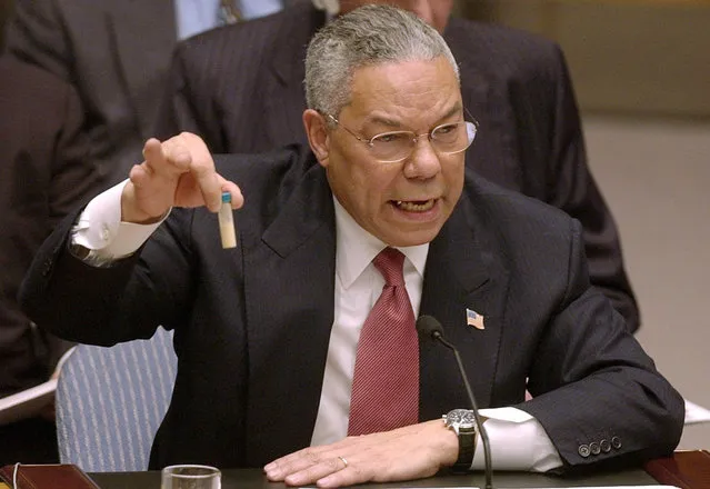 Secretary of State Colin Powell holds up a vial he said could contain anthrax as he presents evidence of Iraq's alleged weapons programs to the United Nations Security Council in this February 5, 2003 photo. (Photo by Elise Amendola/AP Photo/The Atlantic)