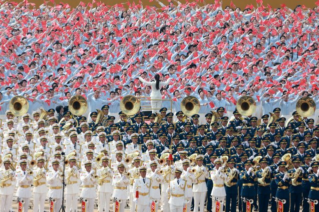 A military band and choir members perform during a military parade to mark the 80th anniversary of the end of World War Two, in Beijing, China, on September 3, 2025. (Photo by China Daily via Reuters)
