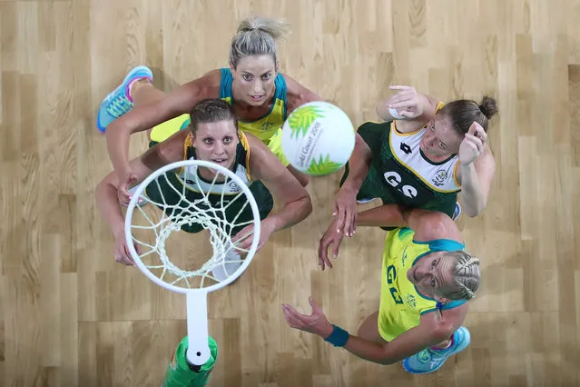 Ine-Mari Venter of South Africa shoots while Laura Geitz and April Brandley of Australia defend during the Netball match between Australia and South Africa on day four of the Gold Coast 2018 Commonwealth Games at Gold Coast Convention Centre on April 8, 2018 on the Gold Coast, Australia. (Photo by Chris Hyde/Getty Images)