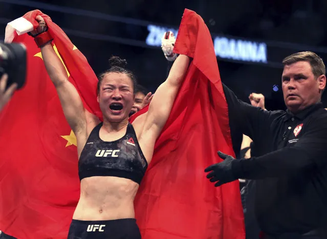 Zhang Weili celebrates her win by decision over Joanna Jedrzejczyk in the women's strawweight championship mixed martial arts bout at UFC 248 on Saturday, March 7, 2020, in Las Vegas. (Photo by L.E. Baskow/Las Vegas Review-Journal via AP Photo)