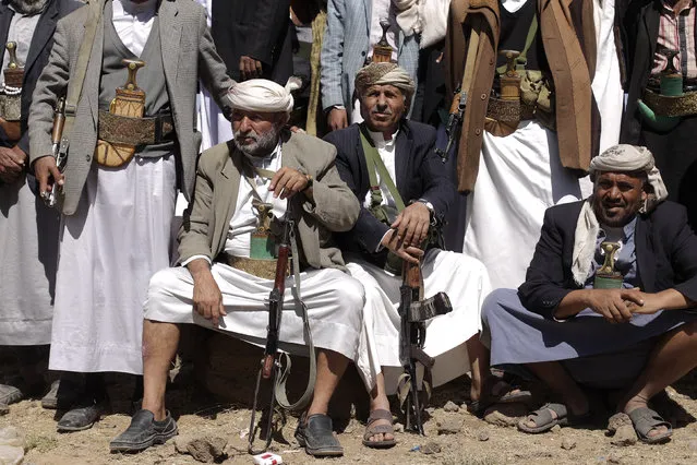 Tribesmen loyal to the Shi'ite Houthi group attend a tribal gathering to show support to the group in Amran province north of the Yemeni capital Sanaa March 13, 2014. (Photo by Khaled Abdullah/Reuters)