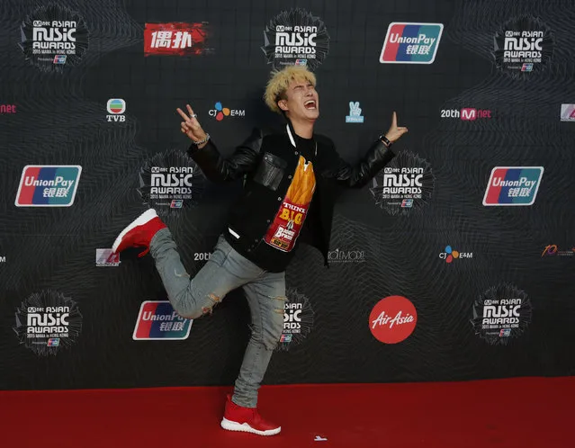 South Korean hip hop rapper San E poses on the red carpet during 2015 Mnet Asian Music Awards (MAMA) in Hong Kong, China December 2, 2015. (Photo by Bobby Yip/Reuters)