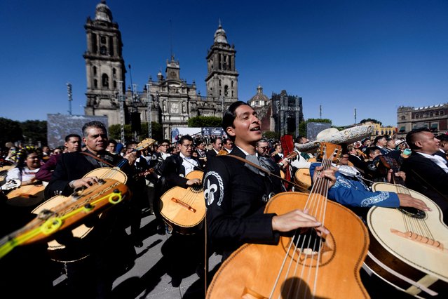 Hundreds of mariachis perform simultaneously traditional Mexican songs “Cielito Lindo” and “El son de la negra” at the Zocalo square in Mexico City, Mexico, on November 10, 2024. (Photo by Quetzalli Nicte-Ha/Reuters)