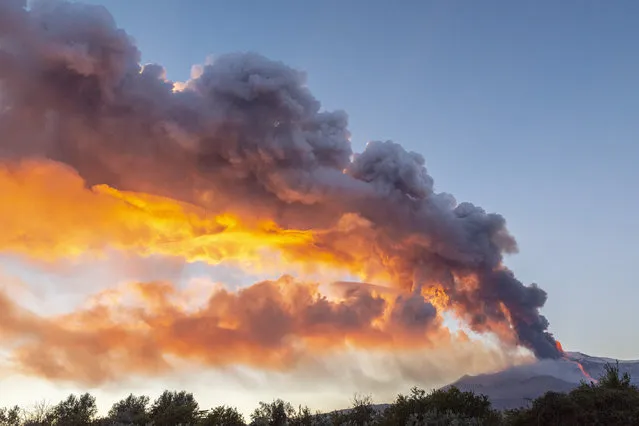 Eruption at Mount Etna, in the late afternoon there was a major increase in volcanic activity at the Southeast Crater, followed by a violent pyroclastic flow accompanied by tall lava fountains and lava flows along the flanks of the Southeast crater, photo taken from the village of MIlo near Catania on February 16, 2021. (Photo by Salvatore Allegra/Anadolu Agency via Getty Images)