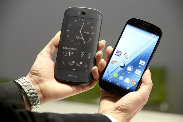 Russian-made Yotaphone unveils its new model, the Yotaphone 2 in Helsinki, Finland, Thursday, January 29th, 2015. The android-based phone claims to be the world's first double screen smartphone. (Photo by Jussi Nukari/AP Photo/Lehtikuva) 