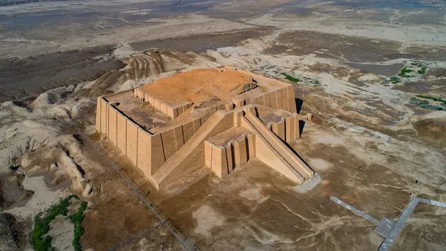 An aerial photo shows archeological site of the 6,000-year-old archaeological site of Ur during the preparations for Pope Francis' visit near Nasiriyah, Iraq, Saturday, March 6, 2021. Pope Francis arrived in Iraq on Friday to urge the country's dwindling number of Christians to stay put and help rebuild the country after years of war and persecution, brushing aside the coronavirus pandemic and security concerns to make his first-ever papal visit. (Photo by Nabil al-Jourani/AP Photo)