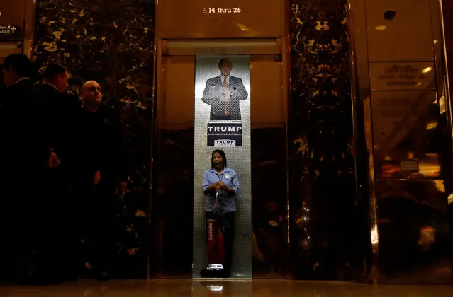 A worker yawns as the elevator doors close in the lobby of Republican president-elect Donald Trump's Trump Tower in New York, New York, U.S. November 14, 2016. (Photo by Carlo Allegri/Reuters)