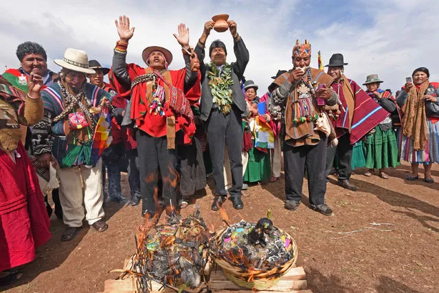 Bolivia's President Evo Morales (C) participates in a Aymara ceremony demanding for rain in Laja near La Paz, November 27, 2016. (Photo by Enzo De Luca/Reuters/Courtesy of Bolivian Presidency)