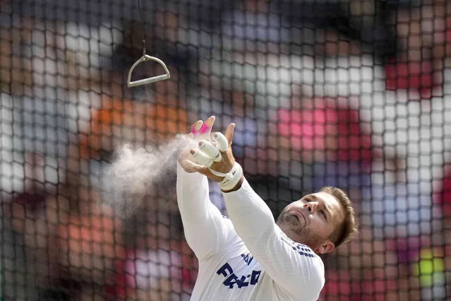 Yann Chaussinand, of France, releases the hammer making an attempt in the Men's hammer throw qualification during the World Athletics Championships in Budapest, Hungary, Saturday, August 19, 2023. (Photo by Matthias Schrader/AP Photo)