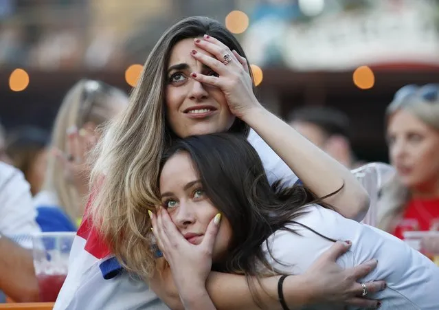 England supporters react as they watch the UEFA EURO 2020 semi-final football match between England and Denmark in London, United Kingdom on July 7, 2021. (Photo by Andrew Boyers/Action Images via Reuters)