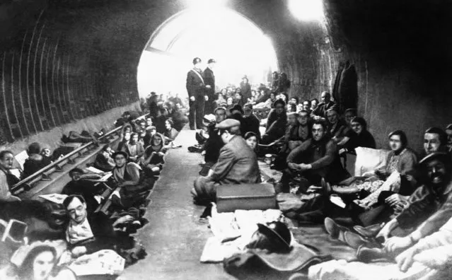 Built for public transportation, this subway finds greater use in war-time London as an air-raid shelter, October 21, 1940. Although the quarters are cramped, they are much to be preferred to the dangers above ground during night-long bombing attacks on the capital. (Photo by AP Photo)