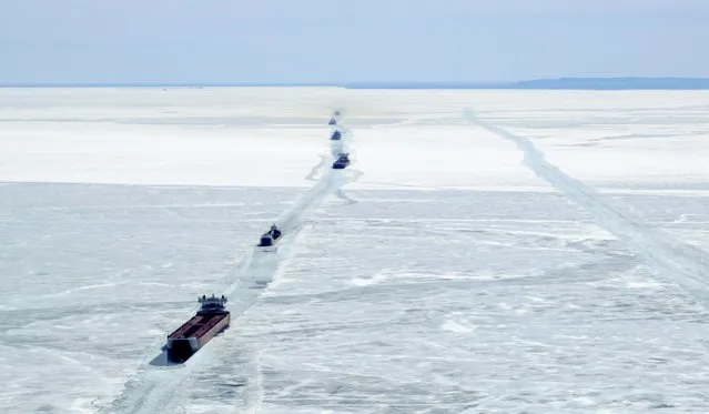 Freighters trapped in ice are shown in this aerial photo near Whitefish Bay on Lake Superior northwest of Sault Ste. Marie, Ontario April 7, 2015. (Photo by Kenneth Armstrong/Reuters)