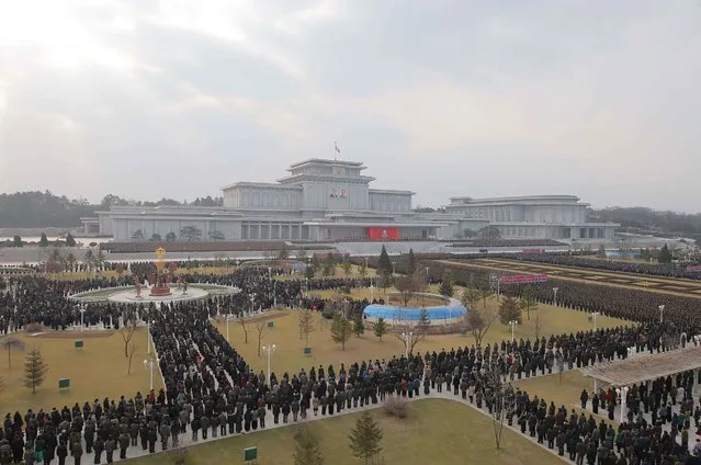 This picture released from North Korea's official Korean Central News Agency (KCNA) on December 18, 2016 shows the memorial service for leader Kim Jong Il at the Kumsusan Palace of the Sun in Pyongyang on December 17, the fifth anniversary of his demise. (Photo by AFP Photo/KCNA)