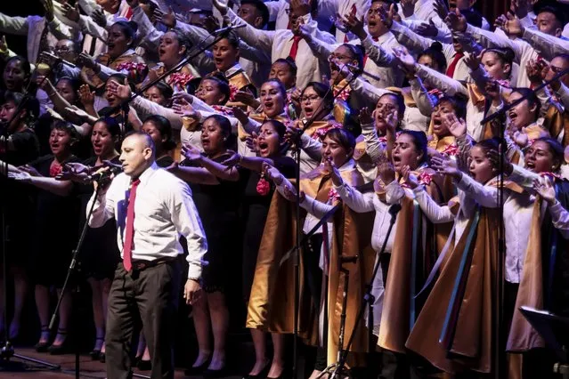 A group of 200 prisoners from seven penitentiary establishments present the Choral symphonic concert “Art to humanize, Humanize to resocialize” at the Grand National Theater of Lima on December 27, 2023 in Lima, Peru.This presentation promotes cultural diversity with an intercultural and inclusive approach. Recognizes and celebrates the diverse artistic expressions and cultural identity of people deprived of liberty in prisons nationwide.The musical repertoire will be performed by three music masters Wilfredo Tarazona, Marco Romero and Mauricio Mesones and the event was attended by more than 500 people, including relatives of the inmates and the general public. (Photo by Klebher Vasquez/Anadolu via Getty Images)