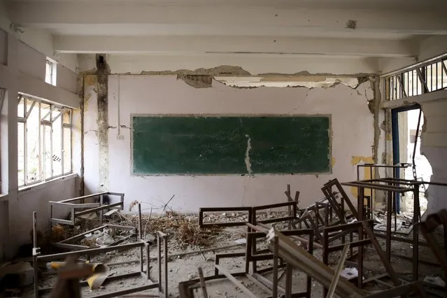A view shows a damaged classroom inside a school that was run by UNICEF in the rebel-controlled area of Jobar, a suburb of Damascus, Syria March 2, 2016. (Photo by Bassam Khabieh/Reuters)