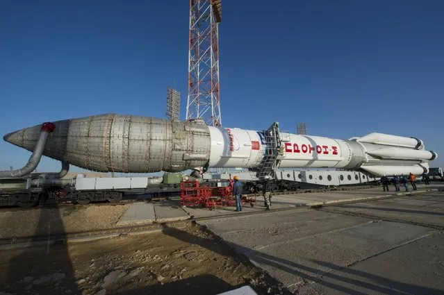 The Proton rocket, that will launch the ExoMars 2016 spacecraft to Mars, is transfered to the launchpad at the Baikonur cosmodrome, Kazakhstan, in this handout photo released by European Space Agency (ESA) on March 11, 2016. (Photo by Stephane Corvaja/Reuters/ESA)