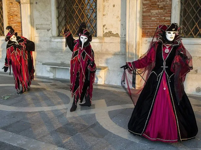 The Carnival of Venice includes a program of gala dinners, parades, dances, masked balls and music events. (Photo by Marco Secchi/Getty Images)