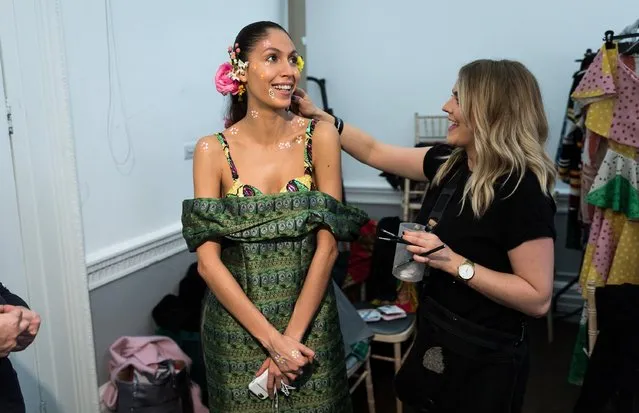 A model backstage ahead of the Tata Naka show during the London Fashion Week February 2017 collections at the ICA on February 21, 2017 in London, England. (Photo by Tim P. Whitby/Getty Images)