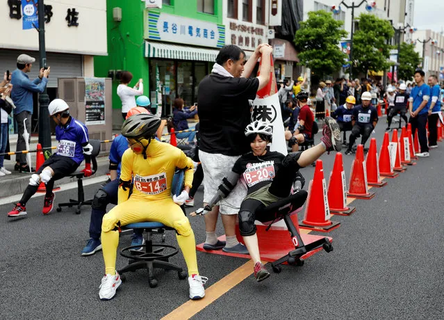 A racer crushes during ISU-1 Hanyu Grand Prix, while taking part in the office chair race ISU-1 Grand Prix series, in Hanyu, north of Tokyo, Japan, June 9, 2019. (Photo by Issei Kato/Reuters)