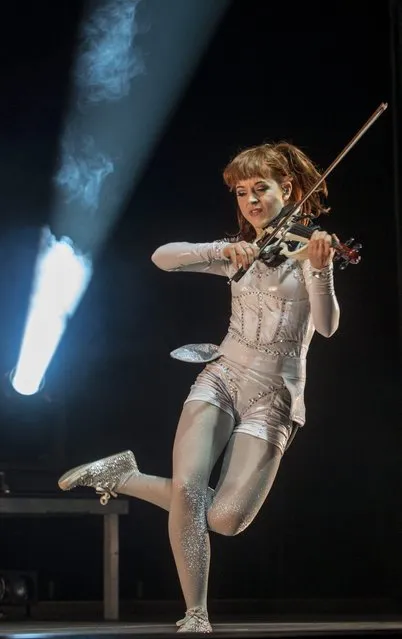 In this July 4, 2015 picture American violinist and dancer Lindsey Stirling performs during her concert in Papp Laszlo Sports Arena in Budapest . (Photo by Bea Kallos/MTI via AP Photo)