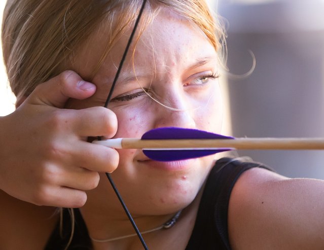 Hailey Bozeman takes aim during archery Friday. A total of 95 campers between the ages of 7-13 took part in the final week of Camp Kiwanis, a traditional residential summer camp program in Marion County, Florida on June 28, 2024. (Photo by Doug Engle/Ocala Star-Banner via USA TODAY Network)