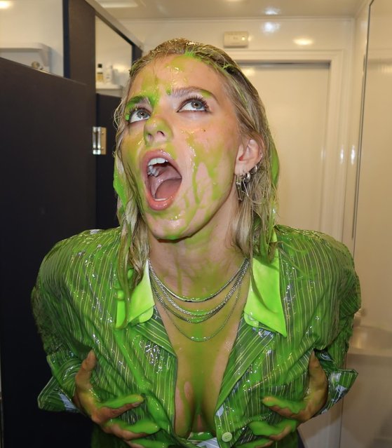 American singer-songwriter and actress Reneé Rapp gets slimed at the Kids’ Choice Awards on July 13, 2024 in Santa Monica, California. (Photo by reneerapp/Instagram)