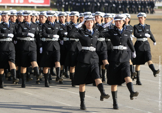 Chinese policewomen march during an anti-terror drill