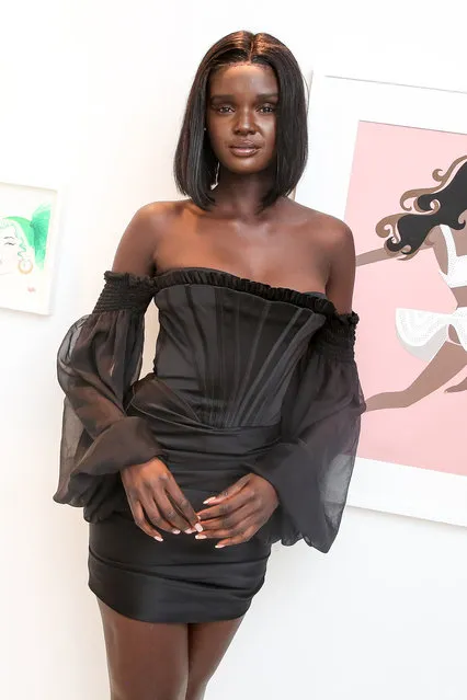 Model Duckie Thot showed off her curves in a black satin bustier number at DUNDAS Art Basel: Opening Night Party in Miami Beach on December 5, 2019. (Photo by Marc Patrick/BFA.com)