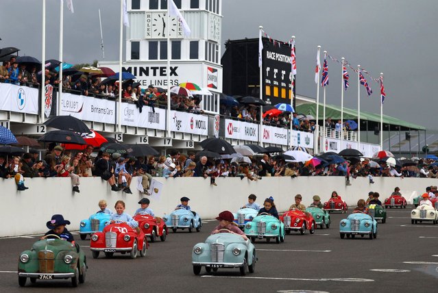 Children take part in the Settrington Cup Pedal Car Race as motoring enthusiasts attend the Goodwood Revival, a three-day historic car racing festival in Goodwood, near Chichester, southern Britain, on September 8, 2024. (Photo by Toby Melville/Reuters)