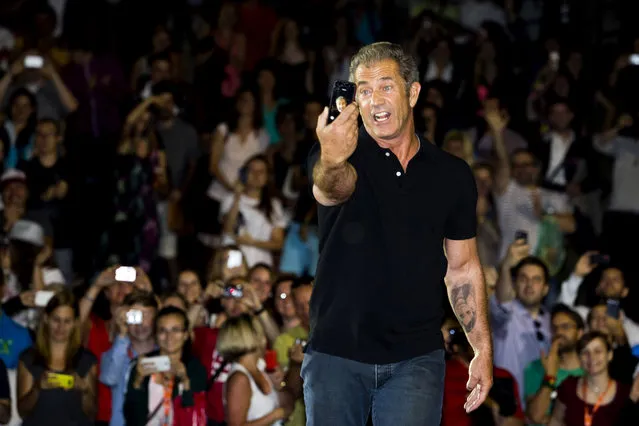 Actor Mel Gibson takes selfie as he puts on outdoor screening of “Mad Max” film during the 49th Karlovy Vary International Film Festival (KVIFF) on July 4, 2014 in Karlovy Vary, Czech Republic. (Photo by Matej Divizna/Getty Images)
