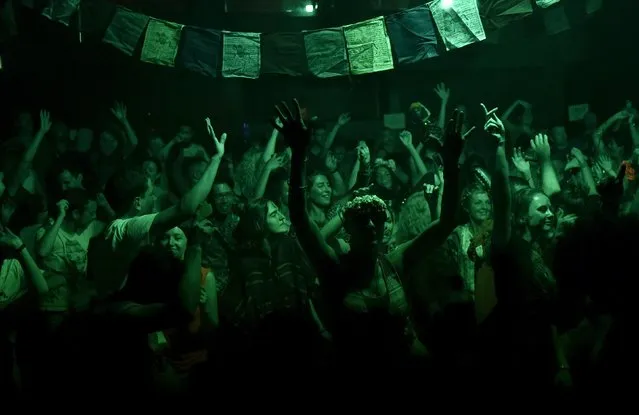 Club-goers dance at “Morning Gloryville” at the Ministry of Sound in south London August 11, 2015. (Photo by Toby Melville/Reuters)