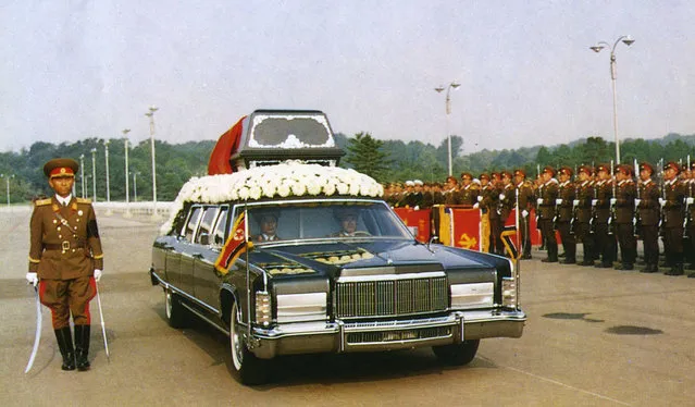 In this July 19,1994, file photo released by the Korean Central News Agency and distributed by the Korea News Service, the vehicle carrying the body of North Korean leader Kim Il Sung passes by the honor guard during his funeral in Pyongyang, North Korea. For nearly 70 years, the three generations of the Kim family have run North Korea with an absolute rule that tolerates no dissent. The ruling family has devoted much of the country's scarce resources to its military but has constantly feared Washington is intent on destroying the authoritarian government. (Photo by Korean Central News Agency/Korea News Service via AP Photo)