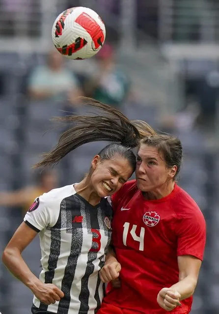 Canada's Vanessa Gilles (14) and Costa Rica's Maria Paula Coto fight for the ball during a CONCACAF Women's Championship soccer match in Monterrey, Mexico, Monday, July 11, 2022. (Photo by Fernando Llano/AP Photo)