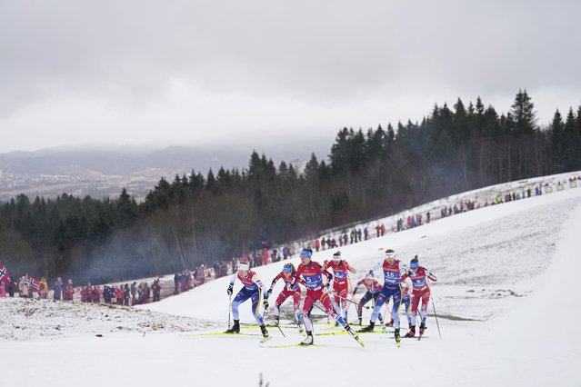 Ebba Andersson, of Sweden, Therese Johaug, of Norway, Heidi Weng, of Norway, Astrid Oeyre Slind, of Norway, Teresa Stadlober, of Austria, Frida Karlsson, of Sweden, and Nora Sanness, of Norway, from left, compete in the cross-country women's mass start 50 Km at the Nordic World Ski Championships in Trondheim, Norway, Sunday, March 9, 2025. (Photo by Matthias Schrader/AP Photo)
