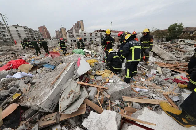 Rescue workers work at the site of a blast in Ningbo, Zhejiang province, China November 26, 2017. (Photo by Reuters/China Stringer Network)
